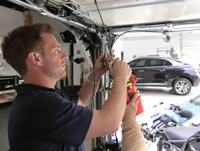 Buena Park Garage Door Repair safety certified technician performing cable replacement in Buena Park