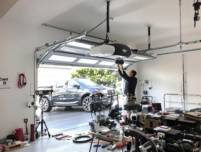 Buena Park Garage Door Repair specialist installing smart garage door opener system in Buena Park home